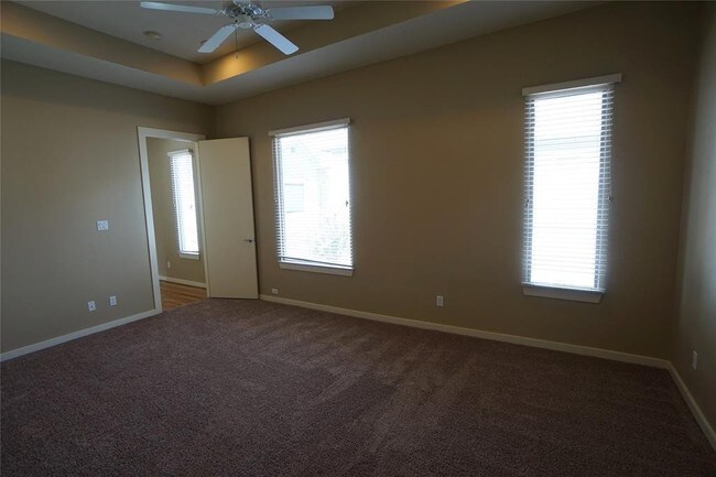 Building Photo - Elegant Gated Townhome Offering Unparallel...