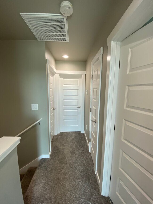 Building Photo - This Townhome Will Having You Falling Head Over Heels!