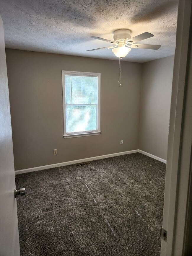 Building Photo - The Best of North Metro Living without the...