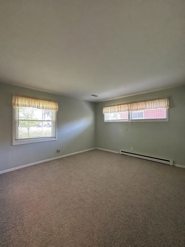 Building Photo - Not Your Typical Rental — Warm, Welcoming 3BR Brick Ranch in a Prime Neighborhood