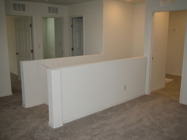 Building Photo - Beautiful 3 Bd, 2.5 bt Two Story home in a gated community with 2 car garage.