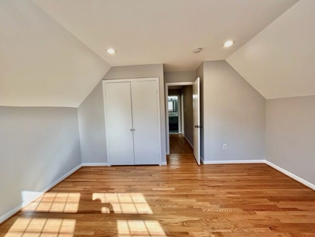 Building Photo - Beautiful and updated 4 BR 2.5 BA with garage and lovely yard!