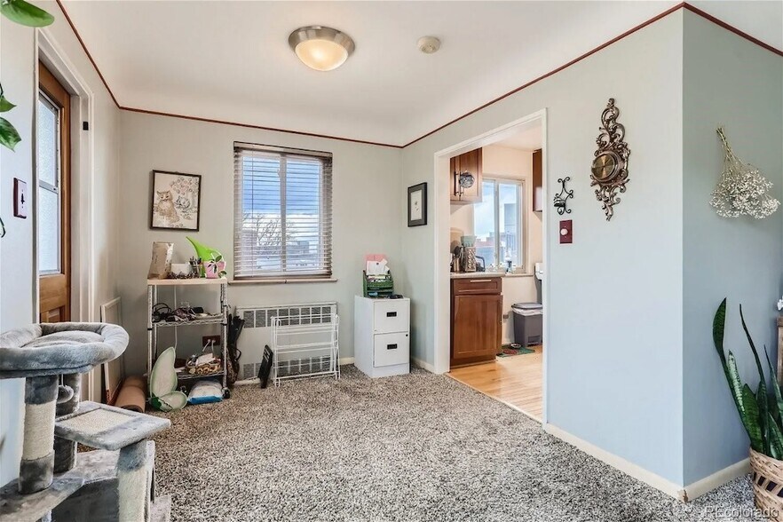 Living Room w West and South facing walls, lots of light. - 1175 Emerson St #302