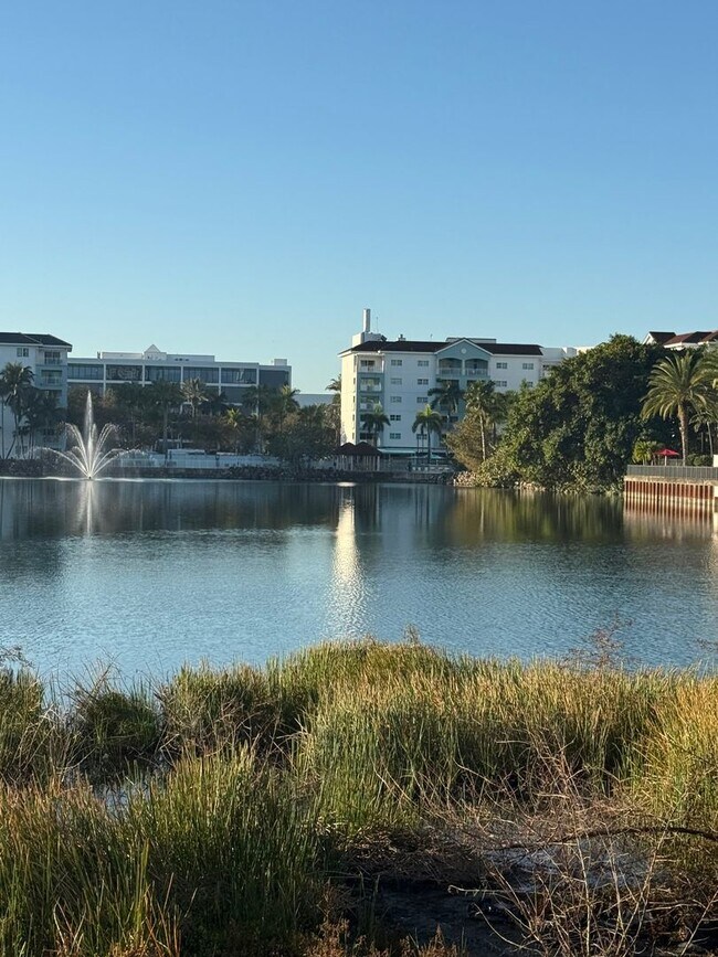 Building Photo - Premium Lake-View URBANA Residence Steps from Downtown Doral