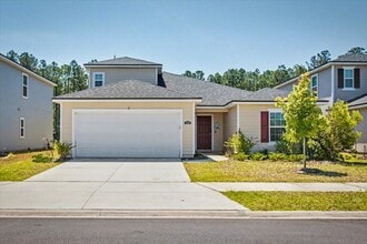 Building Photo - Beautiful Open Layout 4 Bed, 3 Full Bath | A True Masterpiece Backing to a Peaceful Pond with Mod...