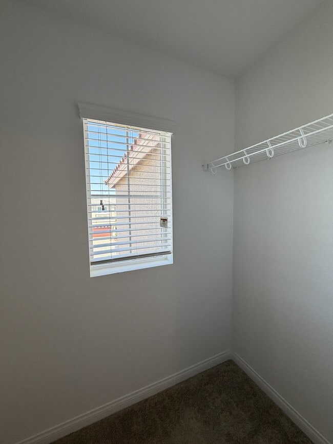 Building Photo - 7869 Tyrell Peaks St