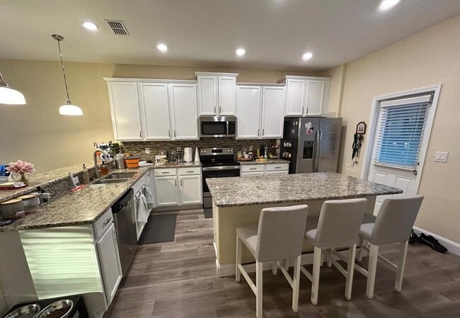 Building Photo - 5637 Water Rose Rd