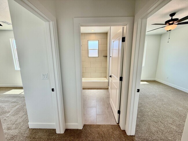 Building Photo - BRAND NEW Three Bedroom Townhome in Desert...