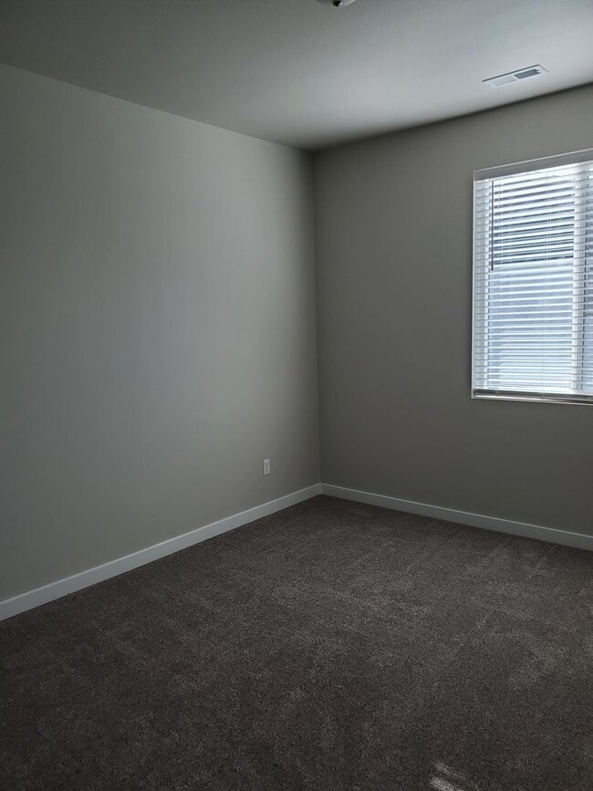 Building Photo - Newer Home with Garage & Fenced Yard