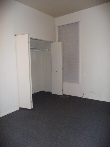 Bedroom 1 - Large enough to fit Queen bed & dresser. Now has hardwood floors! - 2040 N Halsted St