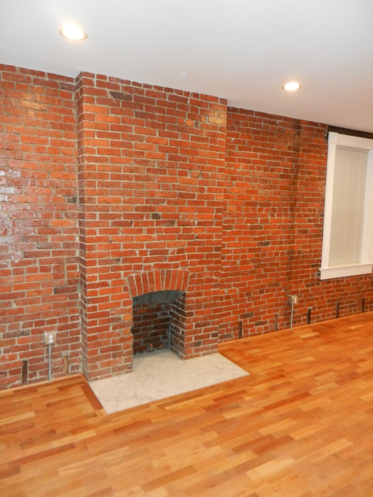 exposed brick walls - 657 Evergreen Rd