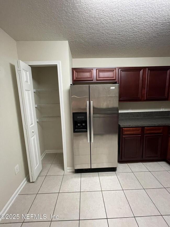 Building Photo - 6965 Ortega Woods Dr
