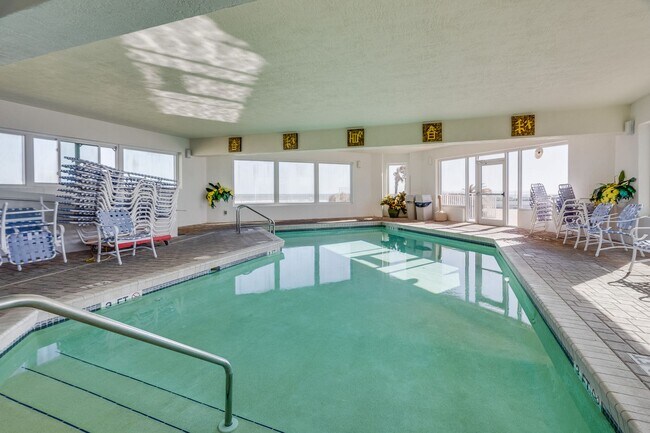Building Photo - Direct Oceanfront Furnished Condo with Bre...