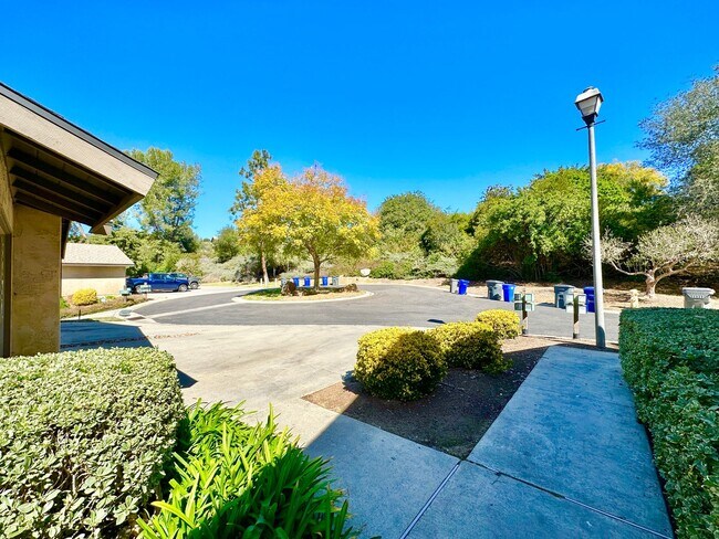 Building Photo - Beautiful, End-Unit, Ground Level, Largest SF 1/1 layout in the Pala Mesa Villas Community with G...