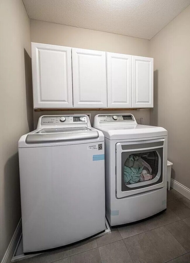 Laundry with bedrooms - 14185 Adelaide Ave