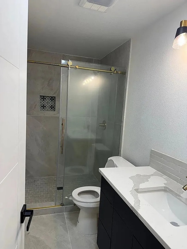 Building Photo - This newly remodeled home