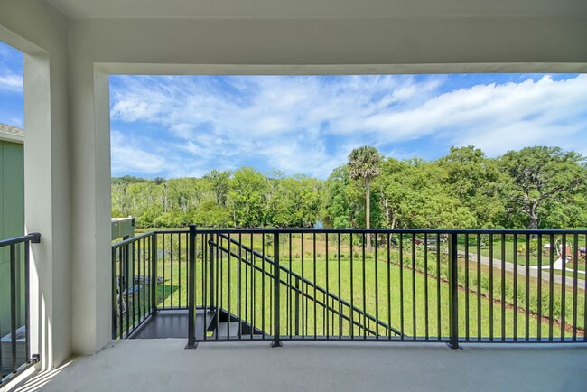 Building Photo - Stunning 4/3 in Gated Dora Parc! Water Views!