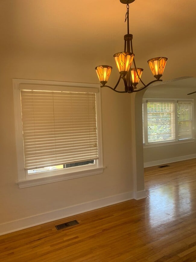 Building Photo - Fully gated Charming craftsman Two bedroom...