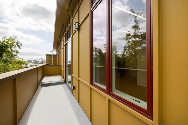 Building Photo - Bright Live-Work Studio with Deck & Tall Ceilings off Lowell Street in Oakland