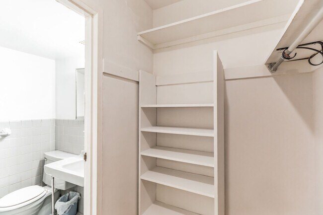 Building Photo - Light-filled studio in the prestigious Towers Condominium, nestled in the heart of Wesley Heights...