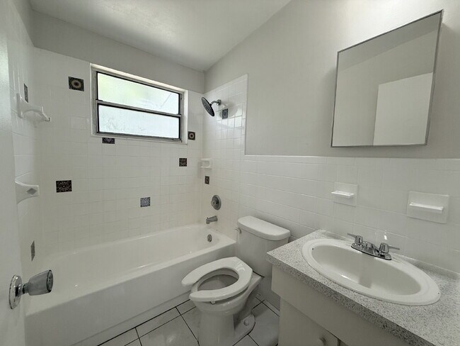 Building Photo - "Charming 1-Bedroom Duplex Retreat on Carn...
