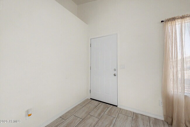 Building Photo - 8563 W Mission Ln