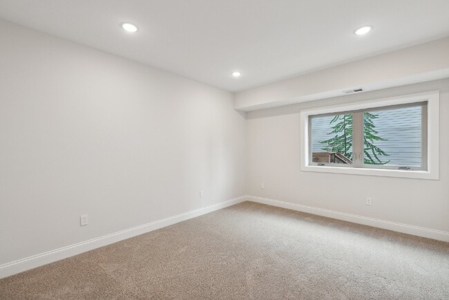 Building Photo - "NEW CONSTRUCTION Urban Living: Spacious 4...