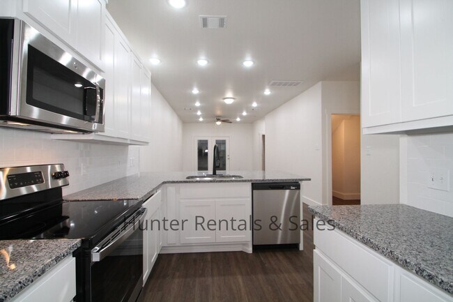 Building Photo - Upscale Four-Bedroom Townhome!
