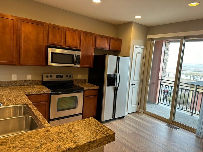 Building Photo - Large garage with attached spacious 2 bedroom townhome