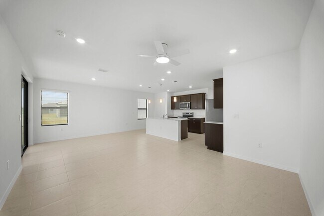 Building Photo - Newly constructed property offers four spacious bedrooms, two full bath in Lehigh Acres