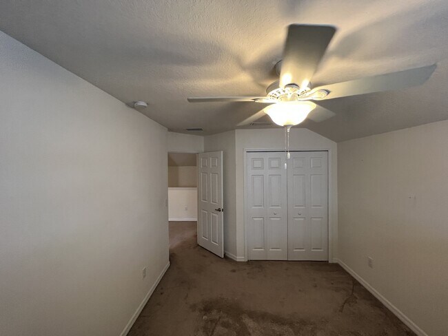 Building Photo - "Spacious 4-Bedroom Lutz Home with Elegant...
