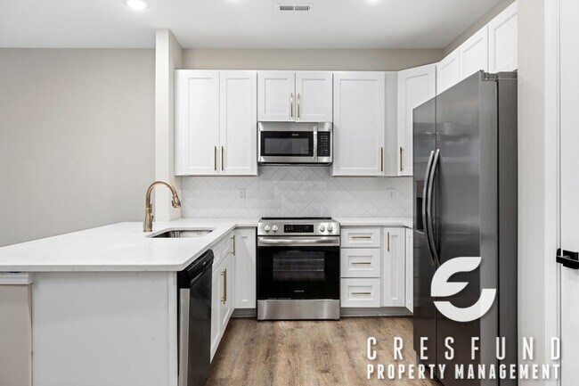 Building Photo - Don't miss out on these new construction Luxury Townhomes on the Lake! Call about our military Sp...