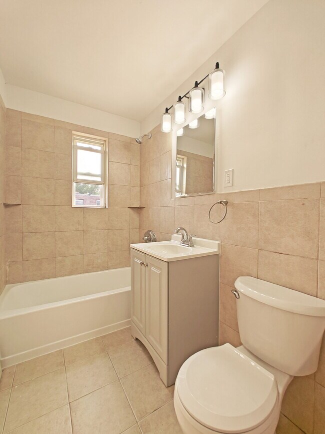 Building Photo - Spacious Fully Renovated Corner-Home Available Now!