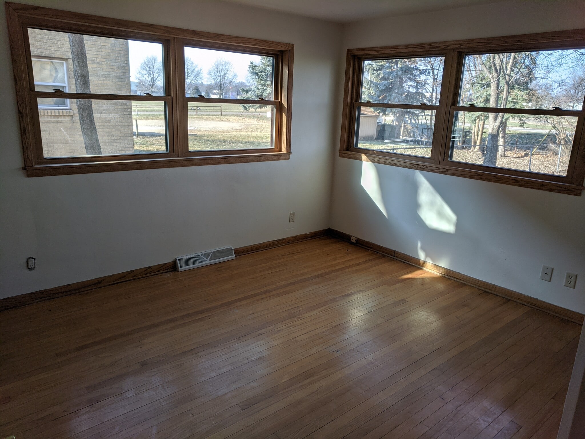 View into the main bedroom from the hallway. Big windows, plenty of light. - 2306 Hoard Street