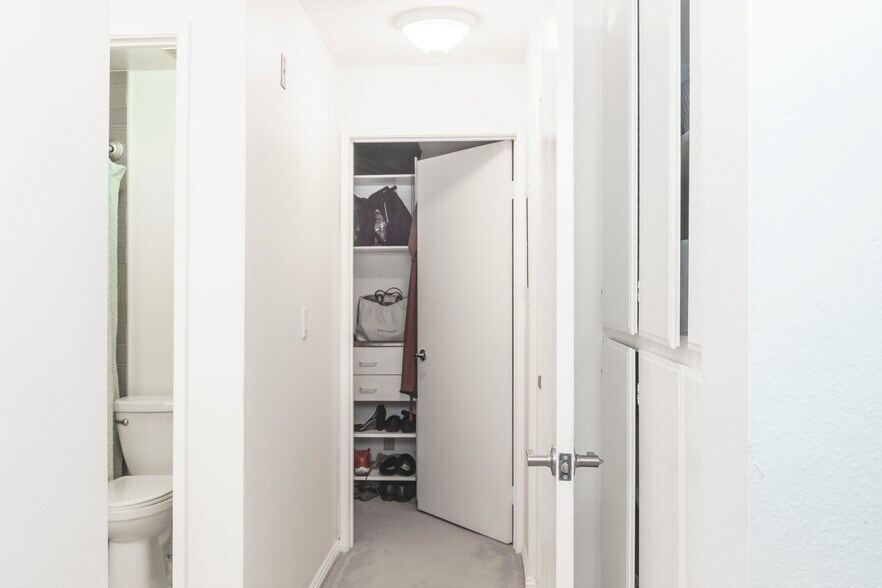 To right of entry en suite closet, bathroom, and room - 10021 Tabor Street