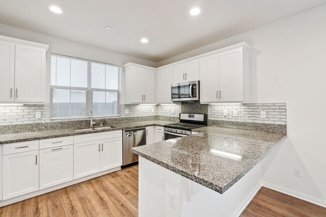 Building Photo - Beautiful newly built 4 bedroom, 3 bath home in the quiet, gated community of Westgate!