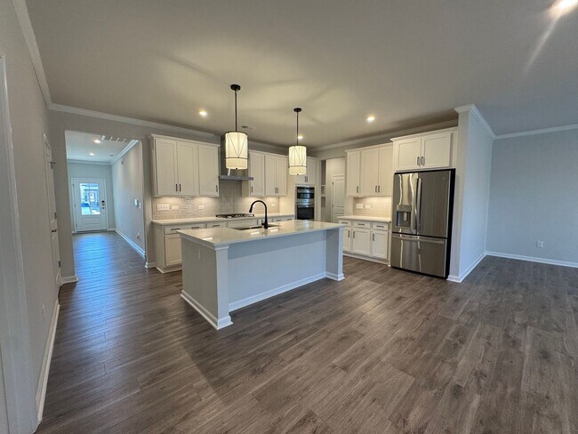 Building Photo - Spacious 1.5-Story 4BR Home with Bonus Room in Active 55+ Community