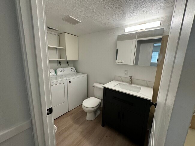 New vanity, faucet, medicine cabinet, and light - 387 N 200 E