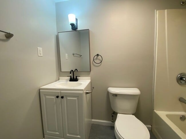 Building Photo - Welcome to this charming three bedroom, on...