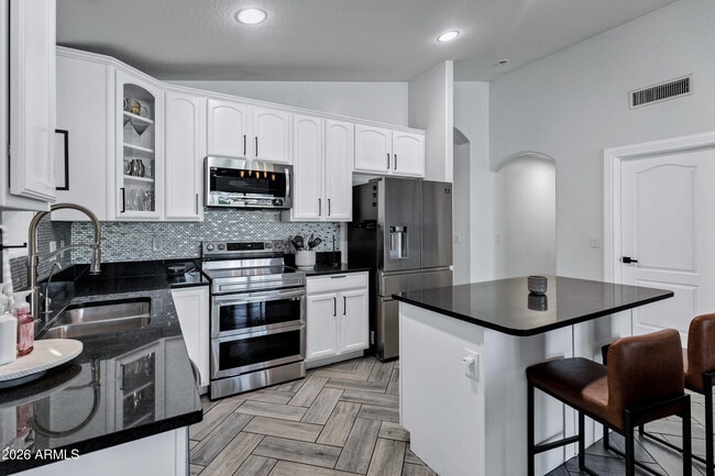 Building Photo - 9558 W Harmony Ln