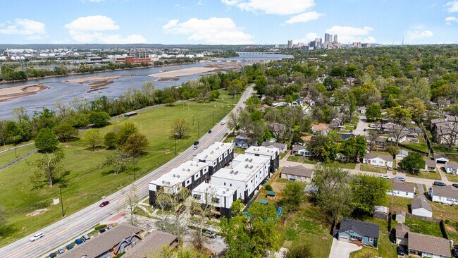 Building Photo - Discover modern elegance in the newly constructed Edgewater Condominiums, a boutique community fe...