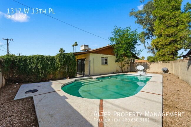 Building Photo - 1317 W 13th Pl