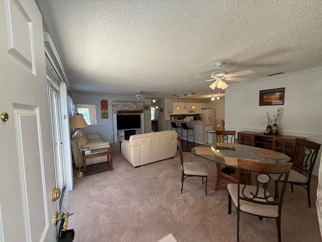 Building Photo - Delightful Turnkey Furnished, 2 bed, 2 Bath Patio Villa available for ANNUAL LEASE