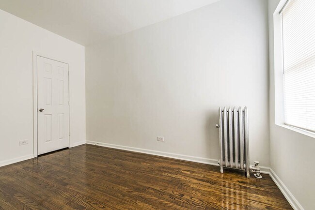 Building Photo - 7752 S Cornell Ave