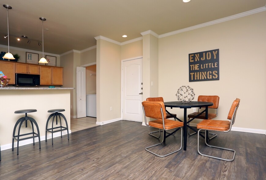 Dining area with hard surface flooring - eaves Twin Creeks