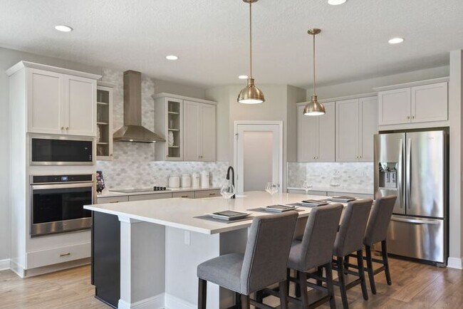 Building Photo - "Unfurnished" Luxurious 5/3.5 Stunning Hom...