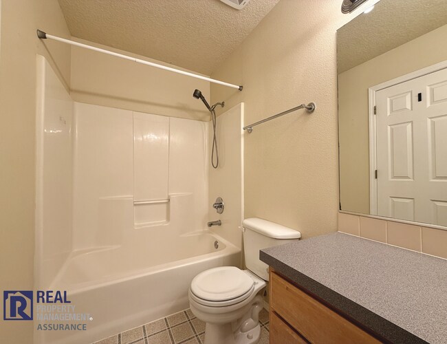 Building Photo - Spacious 4BR/2.5BA Beaverton Home with 3-Car Garage and Covered Deck