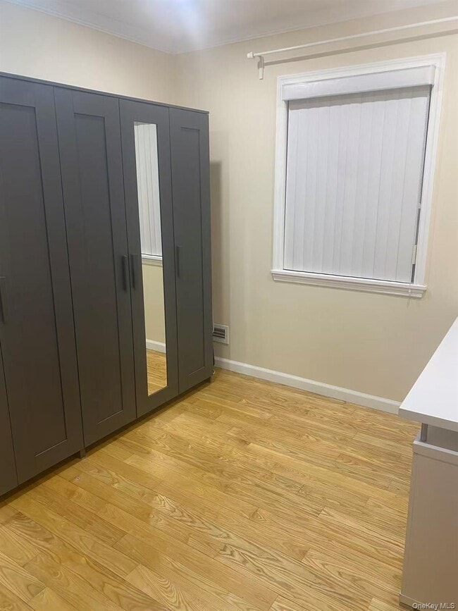 Building Photo - 207-24 28th Ave