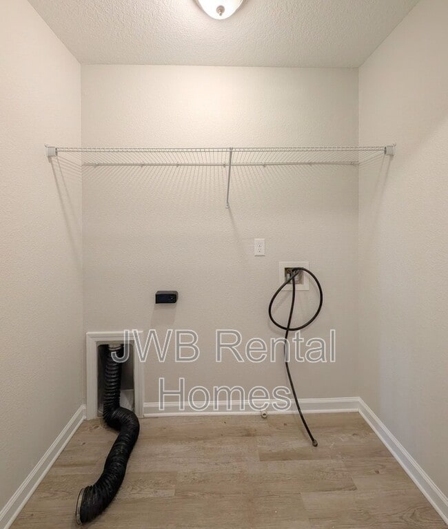 Building Photo - 7876 Playschool Ln