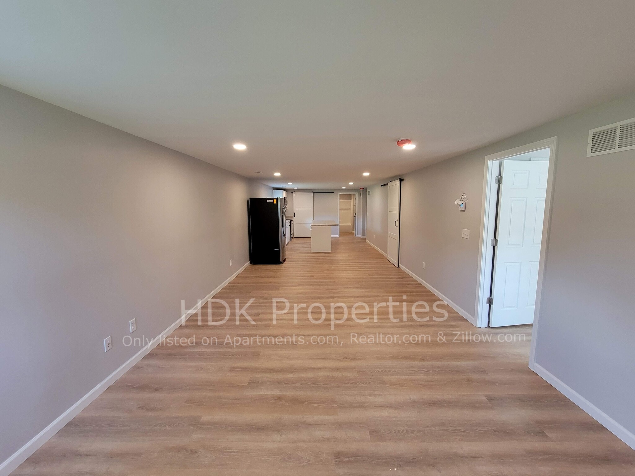 Living room, dining area and kitchen (view from front door) - 1566 Sugar Grove Rd